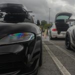 a couple of cars parked next to each other